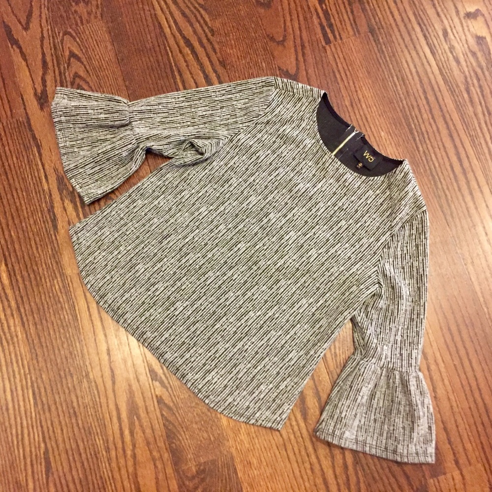 Lightly textured black and white bell sleeve top